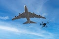 Composite image of drone entering an airliners airspace.