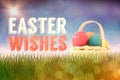 Composite image of easter eggs in wicker basket