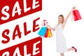 Composite image of elegant blonde with shopping bags and gifts Royalty Free Stock Photo
