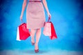 Composite image of elegant brunette with shopping bags Royalty Free Stock Photo