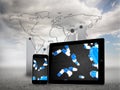 Composite image of falling pills on tablet and smartphone screens Royalty Free Stock Photo