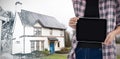 Composite image of female architect showing digital tablet against white background Royalty Free Stock Photo