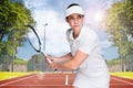 Composite image of female athlete playing tennis Royalty Free Stock Photo