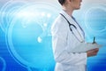 Composite image of female doctor holding clipboard and looking away Royalty Free Stock Photo