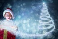 Composite image of festive boy opening gift Royalty Free Stock Photo