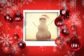 Composite image of festive sandman on the beach Royalty Free Stock Photo