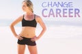 A Composite image of fit blonde standing on the beach Royalty Free Stock Photo