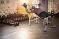 Composite image of fit man exercising with barbell Royalty Free Stock Photo