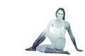 Composite image of fit woman doing the half spinal twist pose in fitness studio Royalty Free Stock Photo