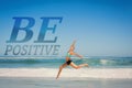 A Composite image of fit woman jumping gracefully on the beach Royalty Free Stock Photo