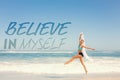 A Composite image of fit woman jumping gracefully on the beach with scarf Royalty Free Stock Photo