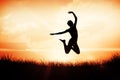 Composite image of full length of a sporty young woman jumping Royalty Free Stock Photo