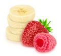 Composite image with garden berries and cutted banana isolated on a white background