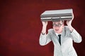 Composite image of geeky businessman holding his briefcase over head Royalty Free Stock Photo