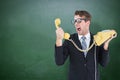 Composite image of geeky businessman shouting at telephone Royalty Free Stock Photo