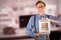 Composite image of geeky businessman showing his tablet pc Royalty Free Stock Photo