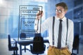 Composite image of geeky businessman writing with marker Royalty Free Stock Photo