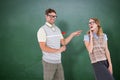 Composite image of geeky hipster holding rose and pointing his girlfriend Royalty Free Stock Photo