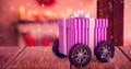 Composite image of gift on wheels Royalty Free Stock Photo