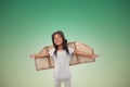 Composite image of girl with fake wings pretending to be pilot Royalty Free Stock Photo