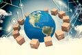 Composite image of globe amidst cardboard boxes Royalty Free Stock Photo