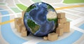 Composite image of globe surrounded by cardboard boxes Royalty Free Stock Photo