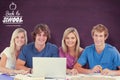 Composite image of a group of students with a laptop look into the camera Royalty Free Stock Photo