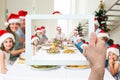 Composite image of hand holding tablet pc Royalty Free Stock Photo