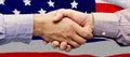 Composite image of hand shake in front of wires Royalty Free Stock Photo