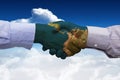 Composite image of hand shake in front of wires Royalty Free Stock Photo