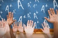 Composite image of hands raising in the air Royalty Free Stock Photo