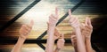 Composite image of hands up and thumbs raised Royalty Free Stock Photo