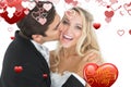 Composite image of handsome bridegroom kissing his wife on her cheek