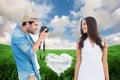Composite image of handsome hipster taking a photo of pretty girlfriend Royalty Free Stock Photo