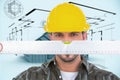 Composite image of handyman looking at spirit level Royalty Free Stock Photo