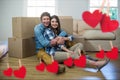 Composite image of hanging red hearts and couple embracing each other Royalty Free Stock Photo