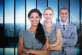 Composite image of happy business team smiling at camera Royalty Free Stock Photo