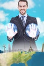 Composite image of happy businessman presenting his hands Royalty Free Stock Photo