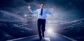 Composite image of happy businessman running with hands up Royalty Free Stock Photo