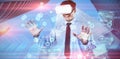 Composite image of happy businessman using vr glasses Royalty Free Stock Photo