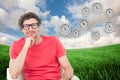 Composite image of happy businessman wearing reading glasses while sitting on chair Royalty Free Stock Photo