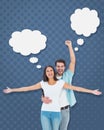 Composite image of happy casual couple cheering together Royalty Free Stock Photo