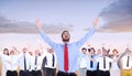 Composite image of happy cheering businessman raising his arms Royalty Free Stock Photo