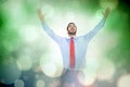 Composite image of happy cheering businessman raising his arms Royalty Free Stock Photo