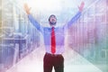 Composite image of happy cheering businessman raising his arms Royalty Free Stock Photo