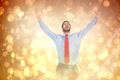 Composite image of happy cheering businessman raising his arms Royalty Free Stock Photo