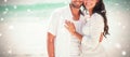 Composite image of happy couple looking at camera Royalty Free Stock Photo