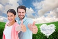 Composite image of happy couple showing thumbs up Royalty Free Stock Photo