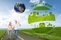 Composite image of happy couple walking holding hands Royalty Free Stock Photo