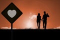 Composite image of happy couple walking holding hands Royalty Free Stock Photo